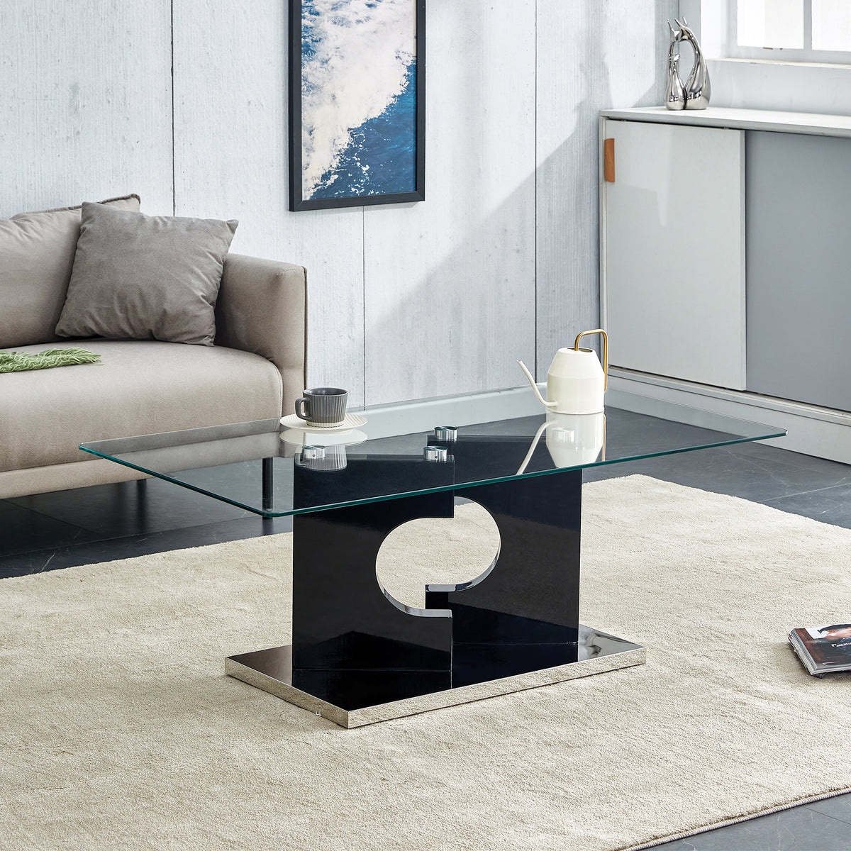 A rectangular modern and fashionable coffee table with tempered glass tabletop and black MDF legs. Suitable for living room.47.2'*25.5'*18'